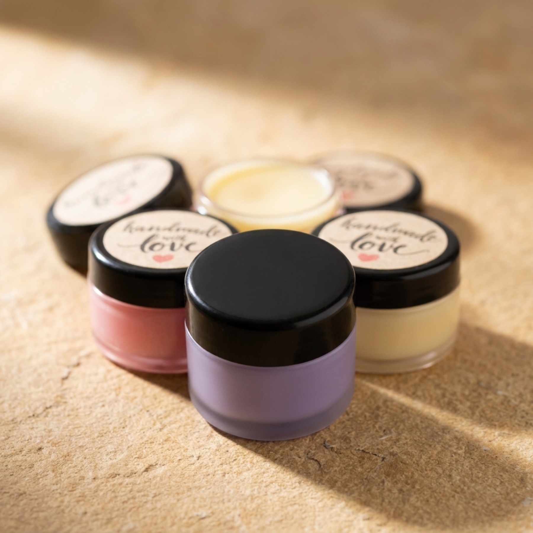 Mia Luxe handmade balm pots in warm natural light